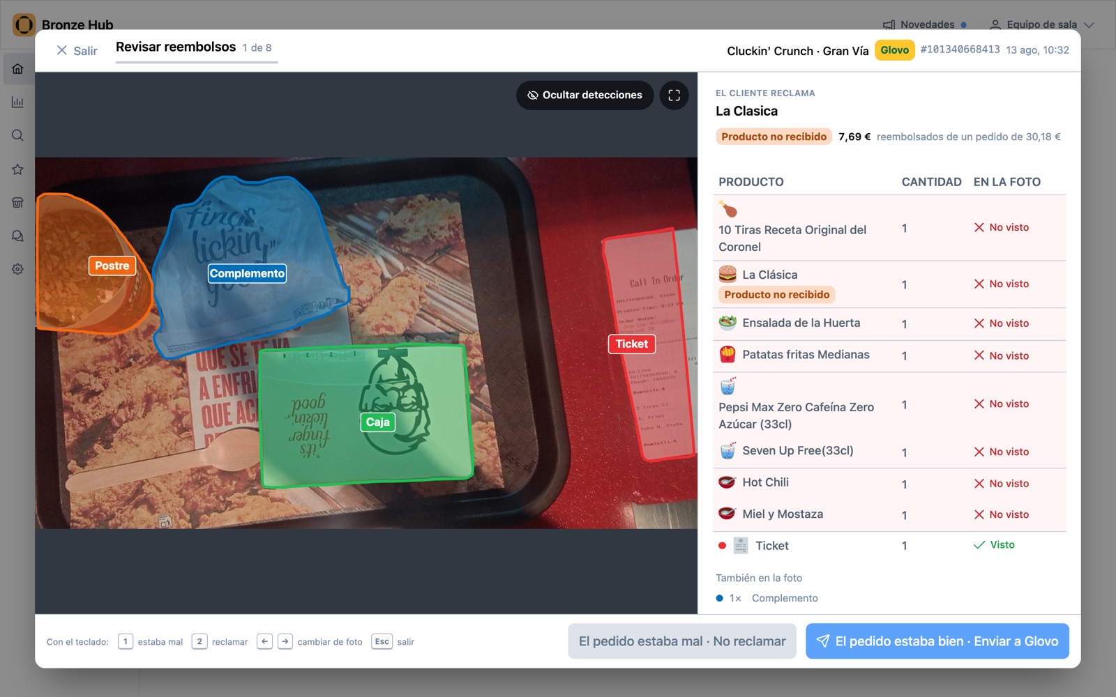 La pantalla de revisión del Hub: la foto del pedido con las detecciones de la IA y el ticket al lado